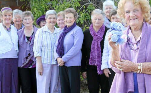 June Lawrence and other local women dress in shades of purple for Lavender Week. June Lawrence and other local women dress in shades of purple for Lavender Week.